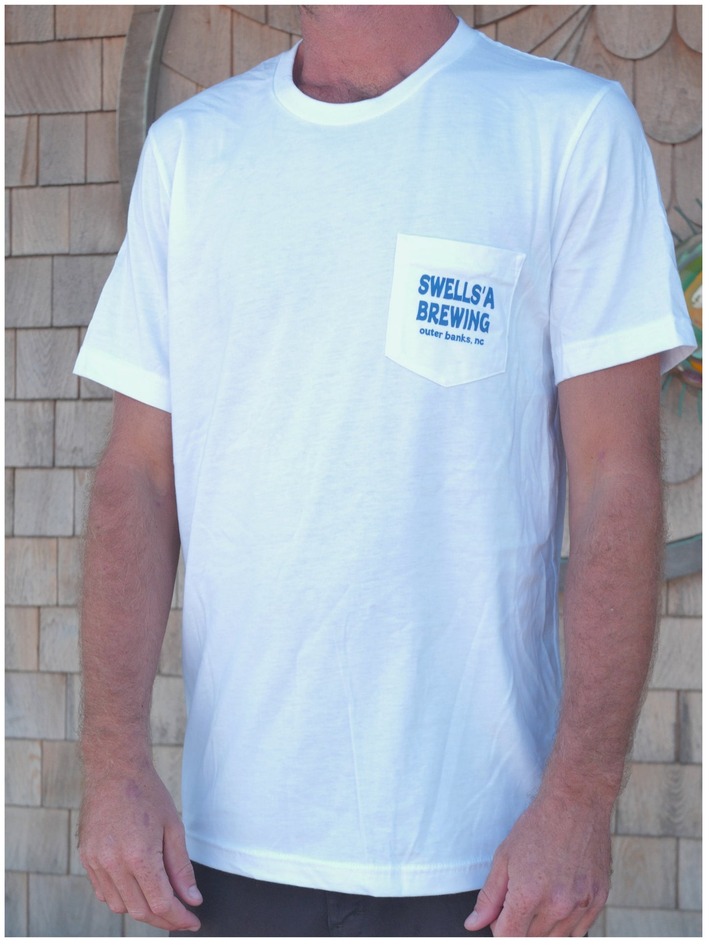 come out of your shell pocket tee